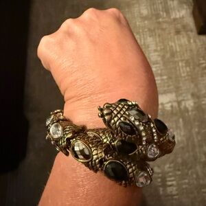 Elegant Gold and Black Snake Bracelet